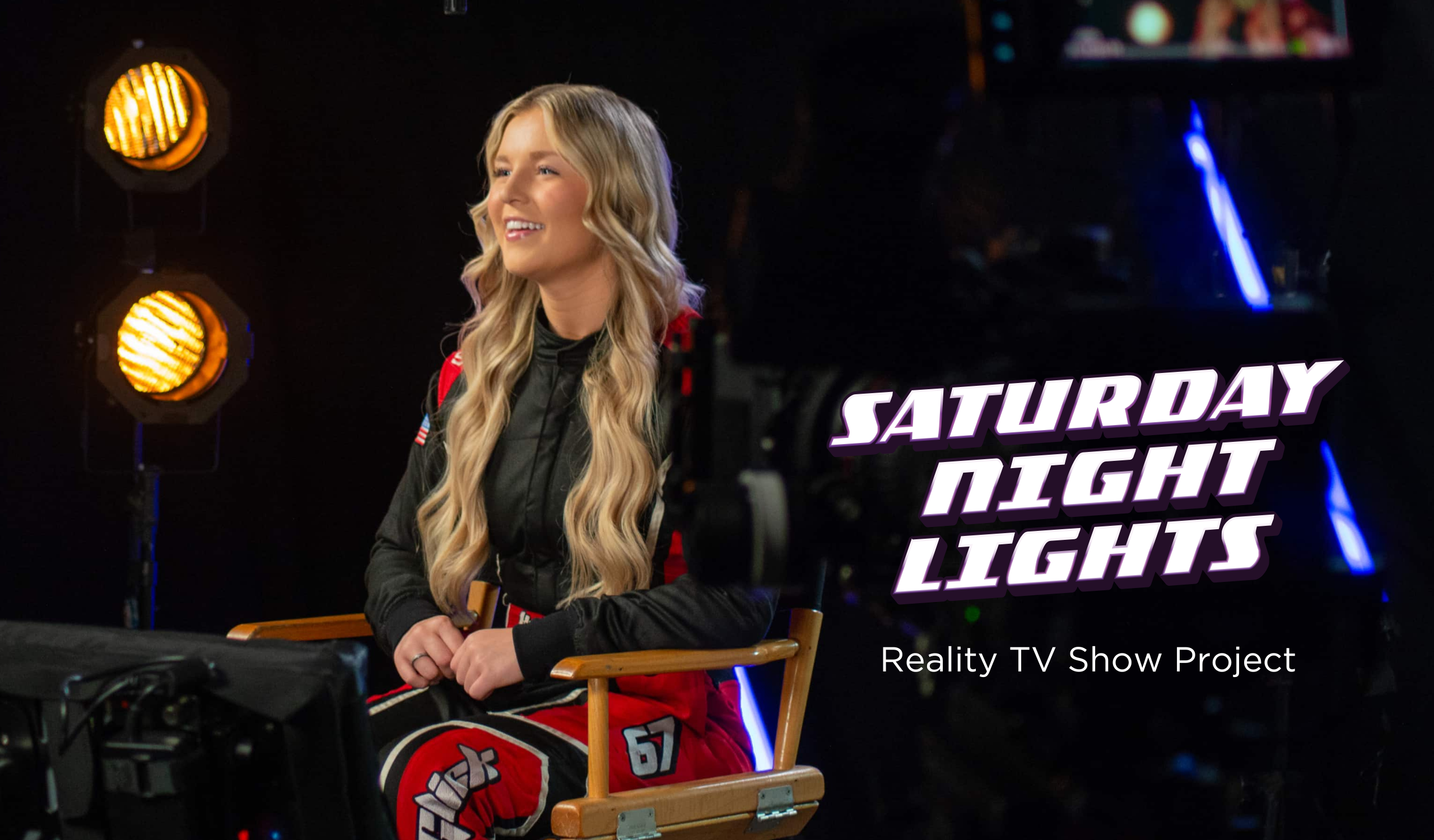 Kylie Glick wearing a red race suit, sitting in a chair for an interview on set on the new reality TV show Saturday Night Lights